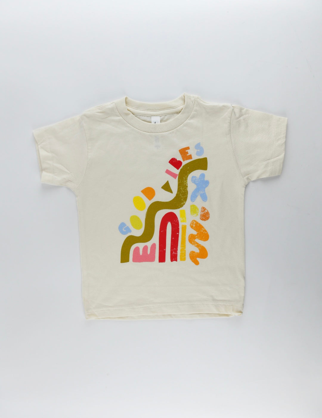 Good Vibes kids graphic tee with colorful abstract shapes