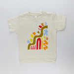 Good Vibes kids graphic tee with colorful abstract shapes